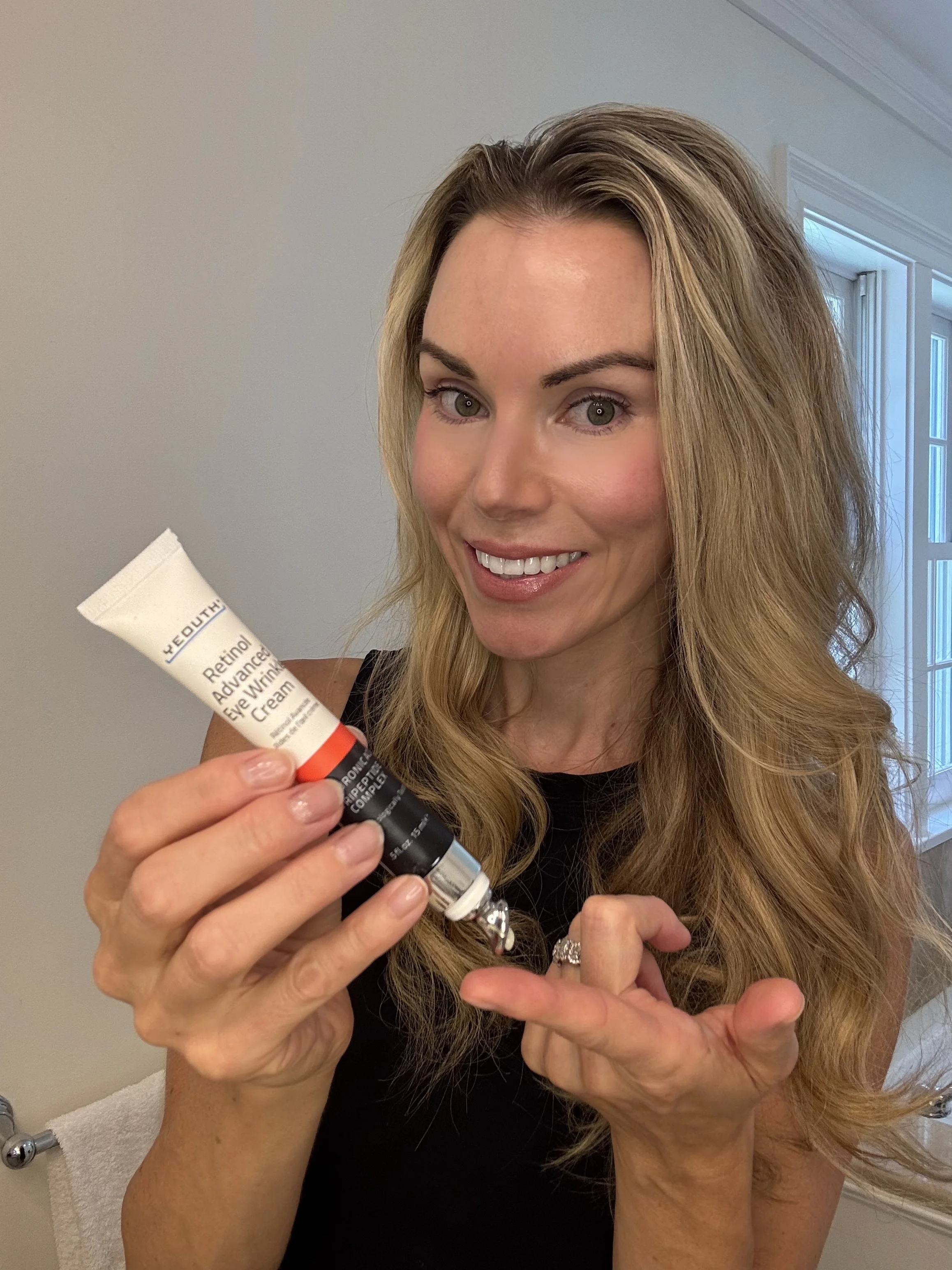 Customer using Retinol Eye Cream